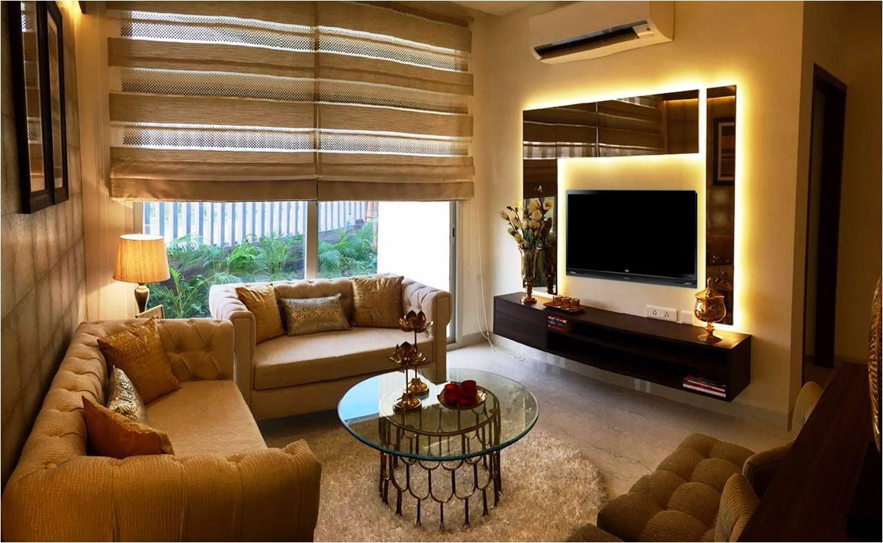 Living room with illuminated TV panel and tufted sofa